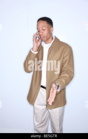 African American man talking on cell phone Stock Photo