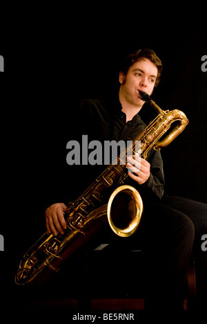Young musician playing the baritone saxophone Stock Photo
