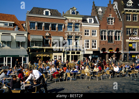 Bar cafe terraces in front of historic houses on the market square of Gouda, province of South Holland, Zuid-Holland, Netherlan Stock Photo