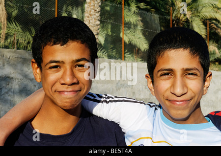 Two Omani boys in football dress, Sultanate of Oman, Arabia, Middle East Stock Photo