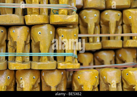 Small teak elephants, Erawan Shrine, Bangkok, Thailand, Asia Stock Photo