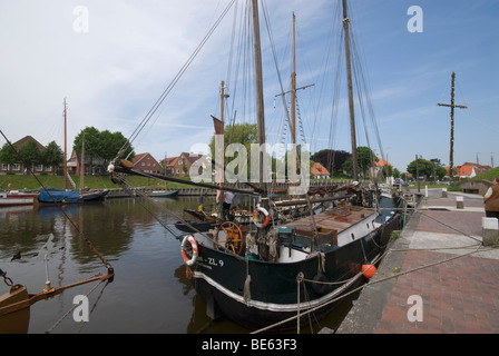 Old Port, Museum Port of Carolinensiel, historic flat-bottomed sailing ships in the port, Ostfriesland, Lower Saxony, Germany,  Stock Photo