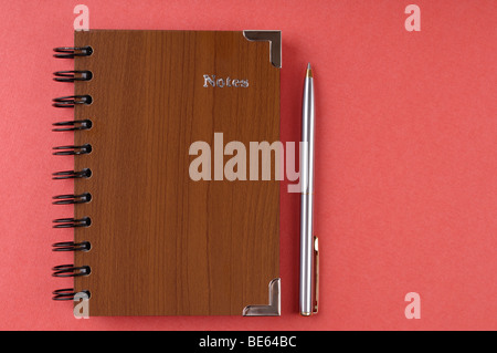 Notepad with a pen Stock Photo
