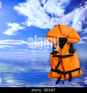 Life vest over blue seascape background Stock Photo
