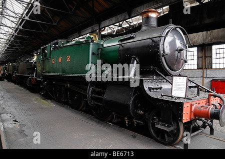 Engine Shed at Didcot Railway Centre, with Steam Train 4144. Didcot, Oxfordshire, England, United Kingdom. Stock Photo