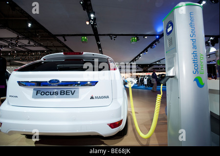 Recharging Ford Focus BEV electric car using plug in charger at Frankfurt Motor Show 2009 Stock Photo