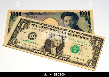 Japanese Yen and US Dollar Bank Notes. Stock Photo