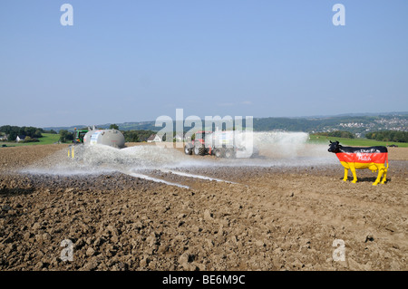 Dairy farmers dumping their milk in protest on a field, Overath, Rheinisch-Bergische Kreis, North Rhine-Westphalia, Germany, Eu Stock Photo