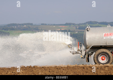 Dairy farmers dumping their milk in protest on a field, Overath, Rheinisch-Bergische Kreis, North Rhine-Westphalia, Germany, Eu Stock Photo