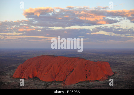 Aerial view of Uluru, Ayers Rock at sunset, Uluru-Kata Tjuta National Park, Northern Territory, Australia Stock Photo