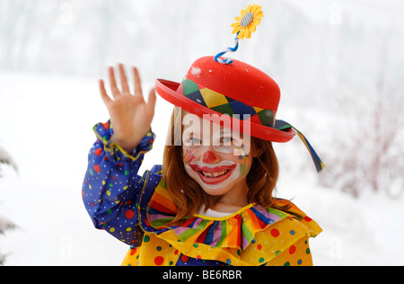 Clown girl in carnival costume Stock Photo