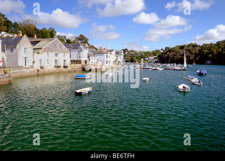 Houses on the waterfront overlooking the boats in Fowey Stock Photo