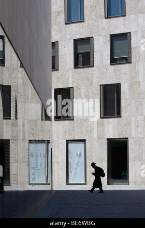 Orthodox Jew in front of the Jewish Center, Jakobsplatz Square, Munich, Bavaria, Germany, Europe Stock Photo