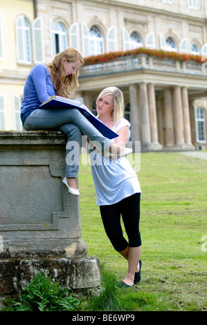 Students at the University of Hohenheim, in front of Hohenheim Castle, Hohenheim, Baden-Wuerttemberg, Germany, Europe Stock Photo