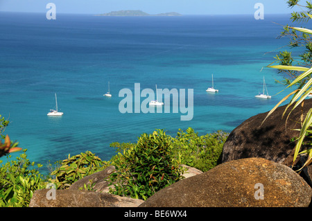 Sailing boats in front of the Anse Volbert, Cote d'Or, Praslin Island, Seychelles, Africa, Indian Ocean Stock Photo