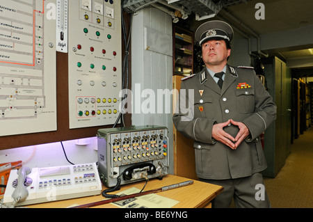 Museum guide in the uniform of a major of the Staatssicherheit national security, the Stasi, Bunkermuseum museum Frauenwald, Th Stock Photo