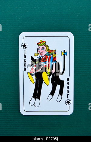 Playing card, joker, Black Peter, king on a black cat Stock Photo