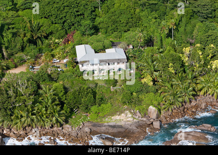 A luxury villa on the coast at Grand Anse beach, Island of Mahe, Seychelles, Indian Ocean, Africa Stock Photo