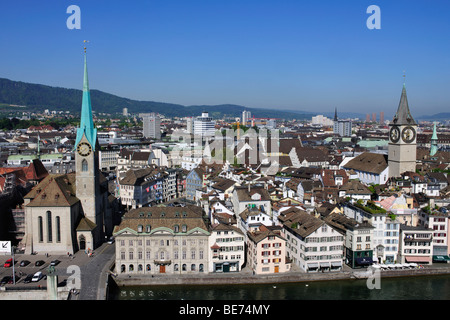 View from a tower of Grossmuenster, Great Minster Church towards the tower of St. Peter Church, the tower of Fraumuenster Churc Stock Photo