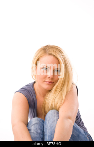 Portrait of a young blonde woman, smiling Stock Photo