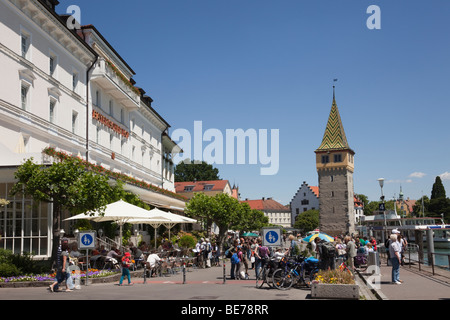 Lindau, Bavaria, Germany. Waterfront promenade busy with tourists in picturesque Old Town (Altstadt) on Lake Constance Stock Photo