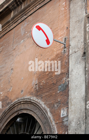 Old italian public telephone sign Stock Photo - Alamy