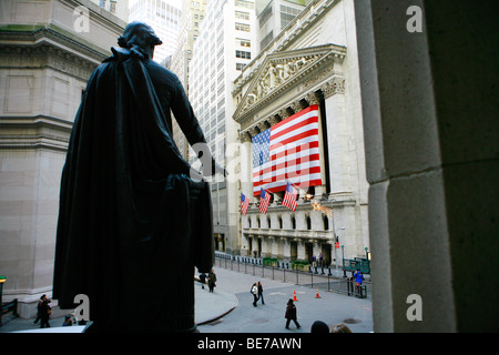 View of the New York Stock Exchange decorated with  a flag of the United States of America near Wall Street in New York Stock Photo