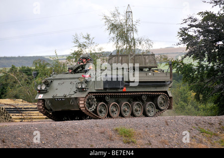 British Army Fv432 Bulldog Armored Personnel Carrier In Action On A 