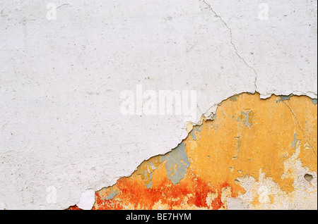 Cracked wall surface background. Chipped paint texture. Stock Photo