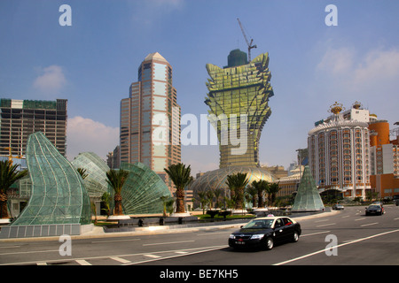 China, Macau, the new Grand Lisboa Hotel and Casino, next to the old Lisboa Casino Stock Photo