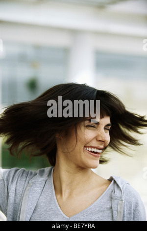 Woman tossing hair, portrait Stock Photo