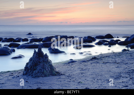 Sandcastle at dusk in the Gulf of Riga Stock Photo