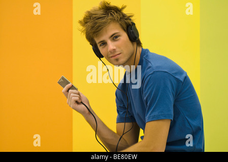 Man listening to Mp3 player Stock Photo