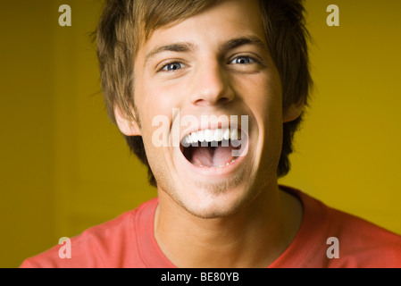 Young man laughing, portrait Stock Photo