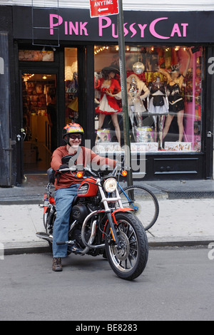 Man riding a bike, Greenwich Village, Manhattan, New York City, New York, USA Stock Photo