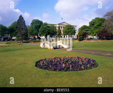 The Queen's Hotel viewed from the Imperial Gardens in the spa town of Cheltenham situated on the edge of the Cotswolds Stock Photo