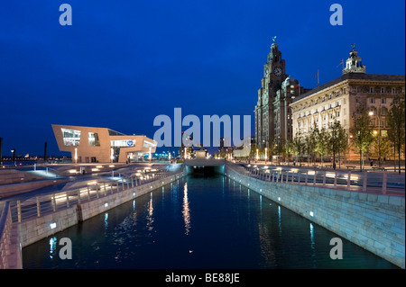 Royal Liver and Cunard Buildings and 'Beatles Story Pier Head' behind the extended Leeds Liverpool Canal, Pier Head, Liverpool Stock Photo