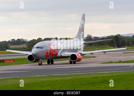 Jet 2.Com [Jet2] Airline Boeing 737-33A Airliner Taxiing After Landing at Manchester Ringway Airport England United Kingdom UK Stock Photo