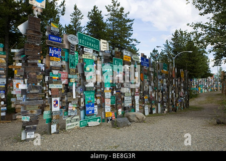 Famous Alaska Highway Sign Post Forrest in Watson Lake, Yukon Territory, Canada Stock Photo