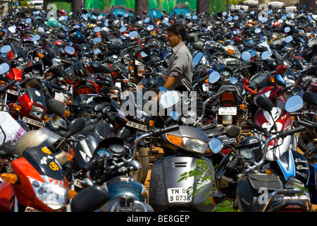 Crowded motorbike parking lot in Chennai in Tamil Nadu India Stock Photo