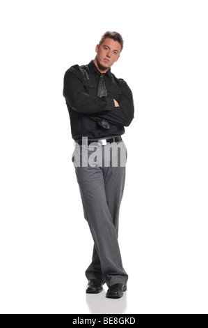 Young businessman wearing a black shirt and tie isolated on a white background Stock Photo