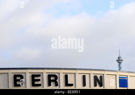 Messe Berlin fairgrounds, writing above the main entrance, radio tower Berlin, Berliner Funkturm, right, Berlin, Germany, Europe Stock Photo