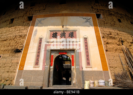 Archway, doorway of a roundhouse, Chinese: Tulou, adobe round house of the Hakka minority, Hukeng, Fujian, China, Asia Stock Photo