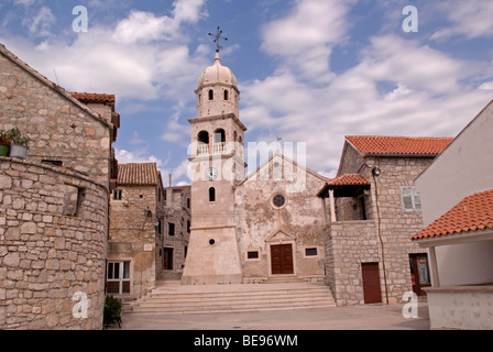 Croatia; Hrvartska; Kroatien; Šibenik-Knin, Privč, Šepurine, church, next to stone houses Stock Photo