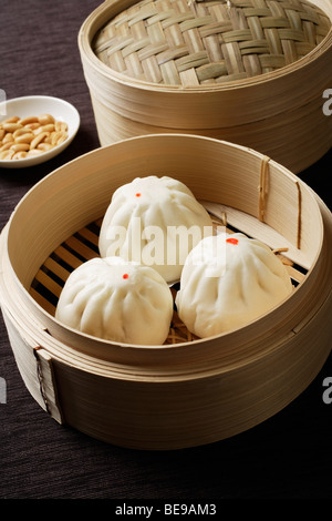 close up of dim sum in bamboo steamer Stock Photo