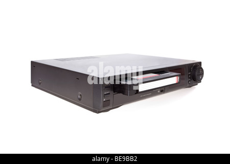 Old Video Cassette Recorder ejecting tape isolated on white background Stock Photo