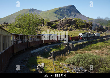 Welsh Highland Railway train near Rhyd Ddu with Snowdon in the background, Gwynedd, Wales Stock Photo
