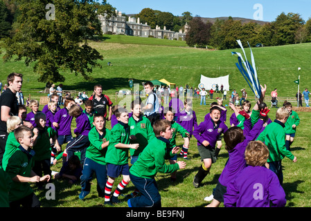 Re-enactment of the traditional 'Carterhaugh Ba Game' at Bowhill House, Selkirk, Scotland - a Homecoming 2009 Event Stock Photo