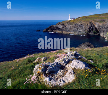 Stinking Cove and the lighthouse at Trevose Head viewed from Dinas Head on the North Cornwall coast near Padstow, Cornwall, England. Stock Photo