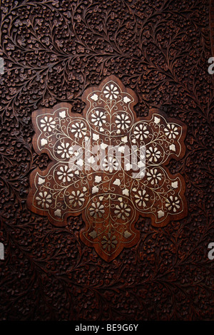 Close up of wood carving on Indian table. Stock Photo